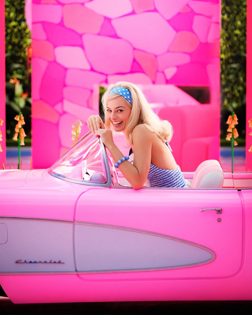 Barbie in her pink car.